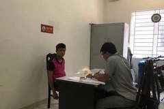 Tùng tại cơ quan công an (Ảnh:PV/Vietnam+) 