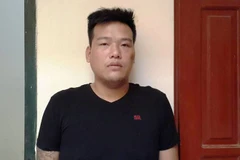 Đối tượng Tùng tại cơ quan công an. (Ảnh: PV/Vietnam+) 