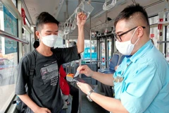 Hà Nội đã thí điểm hệ thống vé điện tử tới 37 tuyến. (Ảnh: Việt Hùng/Vietnam+)