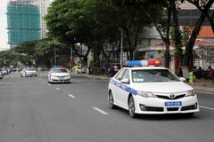 Cán bộ, chiến sỹ Cảnh sát giao thông ra quân bảo đảm trật tự, an toàn giao thông phục vụ Tuần lễ cấp cao APEC tại Đà Nẵng. (Ảnh: Trần Lê Lâm/TTXVN)