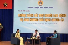 Quang cảnh chương trình tư vấn trực tuyến Chính sách hỗ trợ người lao động bị ảnh hưởng bởi dịch COVID-19. (Ảnh: Thanh Vũ/TTXVN)