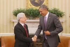 Tổng thống Hoa Kỳ Barack Obama đón Tổng Bí thư Nguyễn Phú Trọng. (Ảnh: Trí Dũng/TTXVN)