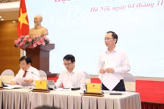 Phó Thống đốc Ngân hàng Nhà nước Đào Minh Tú giải đáp về mức điều chỉnh lãi suất cho vay của các Ngân hàng Thương mại. (Ảnh: PV/Vietnam+)