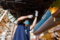 Lĩnh vực bảo dưỡng, sửa chữa máy bay luôn được Vietnam Airlines ứng dụng công nghệ mới nhất. (Ảnh: CTV/Vietnam+)