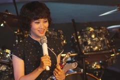 Lê Cát Trọng Lý trong Lễ trao giải Âm nhạc Cống hiến (Ảnh: TTXVN) 