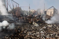 Một xưởng may bị phá hủy sau cuộc không kích của liên quân ở thủ đô Sanaa ngày 14/2 vừa qua. (Ảnh: AFP/TTXVN)