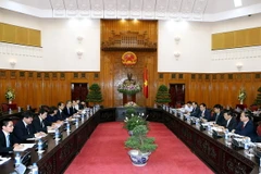 Ủy viên Bộ Chính trị, Phó Thủ tướng Vương Đình Huệ làm việc với Phó Chủ tịch JICA (Nhật Bản) TOMIYOSHI Kenichi. (Ảnh: Nguyễn Dân/TTXVN)