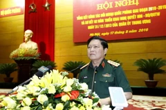 Đại tướng Ngô Xuân Lịch, Ủy viên Bộ Chính trị, Phó Bí thư Quân ủy Trung ương, Bộ Trưởng Bộ Quốc phòng phát biểu tại một hội nghị. (Ảnh: An Đăng/TTXVN)