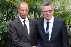 Bộ trưởng Nội vụ Maroc Mohamed Hassad và Bộ trưởng Nội vụ Đức Thomas de Maiziere. (Nguồn: moroccoworldnews.com)