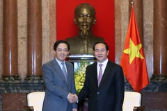 Chủ tịch nước Trần Đại Quang tiếp Đại sứ Trung Quốc tại Việt Nam Hồng Tiểu Dũng đến chào xã giao. (Ảnh: Nhan Sáng/TTXVN)