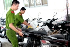 Tang vật xe máy trong vụ án. (Ảnh: Dương Chí Tưởng/TTXVN)