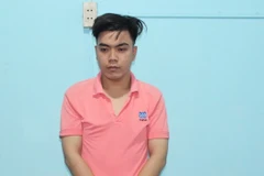 Phan Tấn Đạt tại cơ quan công an. (Ảnh do Công an cung cấp)