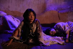 Nghệ sỹ Trà My trong vai bà Thanh Đề sau khi bị đày xuống địa ngục. (Ảnh: PV/Vietnam+)