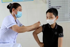 Trạm Y tế xã Vũ Chính, thành phố Thái Bình, tổ chức tiêm vaccine phòng COVID-19 an toàn cho trẻ. (Ảnh: Thế Duyệt/TTXVN)