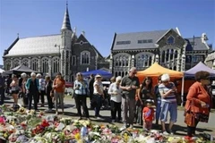 Tưởng niệm các nạn nhân vụ xả súng kinh hoàng ở Christchurch, New Zealand. (Nguồn: Kyodo/TTXVN)