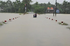 Ngập lụt tại xã Lộc Trì, huyện Phú Lộc, Thừa Thiên-Huế. (Ảnh: Hồ Cầu/TTXVN)