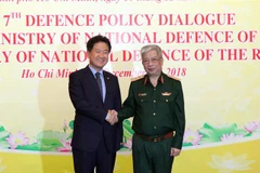 Thượng tướng Nguyễn Chí Vịnh và ông Suh Choo Suk đồng chủ trì Đối thoại Chính sách Quốc phòng Việt Nam-Hàn Quốc lần thứ 7. (Ảnh: Xuân Khu/TTXVN)