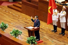 Quang cảnh Lễ tuyên thệ. (Ảnh: Phạm Kiên/TTXVN)