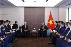 Chủ tịch nước Nguyễn Xuân Phúc tiếp ông Sohn Kyung Sik, Chủ tịch Tập đoàn CJ. (Ảnh: Thống Nhất/TTXVN)