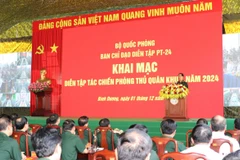 Toàn cảnh buổi khai mạc diễn tập tác chiến phòng thủ Quân khu 7 năm 2024. (Ảnh: Huyền Trang/TTXVN)