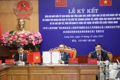 Lễ ký kết Bản ghi nhớ. (Ảnh: Quang Duy/TTXVN)