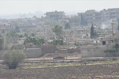 Khói bốc lên trong cuộc giao tranh tại Syria. (Ảnh: AA/TTXVN)