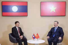 Tổng Bí thư, Chủ tịch nước Tô Lâm tiếp xúc song phương với Tổng Bí thư, Chủ tịch nước Lào Thongloun Sisoulith. (Ảnh: Trí Dũng/TTXVN)