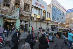 Hiện trường một vụ đánh bom tại thủ đô Baghdad, Iraq. (Ảnh: AFP/TTXVN)