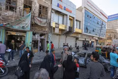 Hiện trường một vụ đánh bom tại thủ đô Baghdad, Iraq. (Ảnh: AFP/TTXVN)