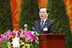 Ủy viên Trung ương Đảng, Bộ trưởng Bộ Khoa học và Công nghệ Huỳnh Thành Đạt trình bày tham luận. (Ảnh: TTXVN)