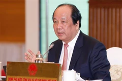 Bộ trưởng, Chủ nhiệm Văn phòng Chính phủ, Người phát ngôn Chính phủ Mai Tiến Dũng chủ trì họp báo. (Ảnh: Dương Giang/TTXVN)