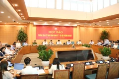 Phiên họp báo về kinh tế xã hội tháng 8/2022 do Ủy ban Nhân dân thành phố Hà Nội tổ chức. (Ảnh: Xuân Quảng/Vietnam+)