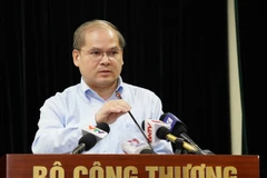 Ông Trần Tuệ Quang, Phó Cục trưởng Cục Điều tiết Điện lực, Bộ Công Thương phát biểu tại họp báo chiều 12/10. (Ảnh: Đức Duy/Vietnam+)