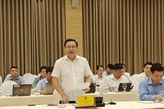 Thứ trưởng Bộ Lao động, Thương binh và Xã hội thông tin tại phiên họp báo Chính phủ tối 4/7. (Ảnh: PV/Vietnam+)