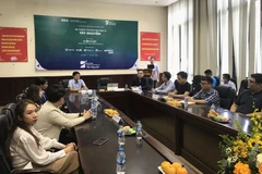 Lễ Ký kết và Khởi động chương trình Bệ phóng thương mại điện tử Tây Nguyên. (Ảnh: Đức Duy/Vietnam+)