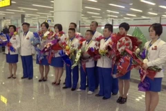 Các vận động viên Triều Tiên được chào đón nồng nhiệt khi về nhà