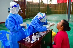 Xét nghiệm COVID-19 tại một địa điểm ở thành phố Thụy Lệ, tỉnh Vân Nam (Trung Quốc), ngày 6/4/2021. (Nguồn: globaltimes.cn)