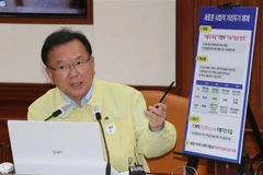 Thủ tướng Hàn Quốc Kim Boo-kyum phát biểu tại Seoul, ngày 20/6/2021. Ảnh: (YONHAP/TTXVN)