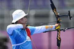 Cung thủ Đỗ Thị Ánh Nguyệt thi đấu tại Olympic Tokyo 2020, ngày 28/7/2021. (Ảnh: AFP/TTXVN)
