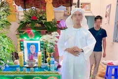 Gia đình bà Tuyến tổ chức đám tang giả. (Ảnh: Trung Hiếu/TTXVN)