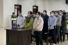 Các bị cáo tại phiên tòa xét xử vụ án tại GPBank. (Ảnh: Doãn Tấn/TTXVN)