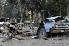 Hiện trường một vụ đánh bom xe tại Damascus, Syria. (Ảnh: AFP/TTXVN)
