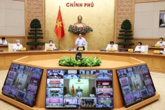 Thủ tướng Phạm Minh Chính, Trưởng Ban Chỉ đạo chủ trì buổi làm việc trực tuyến với các địa phương và 9.043 xã, phường, thị trấn trên cả nước. (Ảnh: Dương Giang/TTXVN)