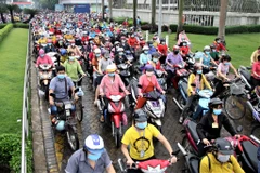 Công nhân làm việc tại Công ty TNHH PouYuen Việt Nam trong giờ tan ca. (Nguồn: thanhnien)