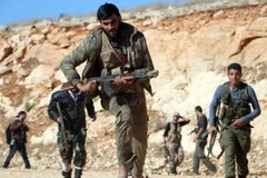 Lực lượng nổi dậy Syria. (Ảnh: AFP)