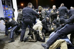 Tình trạng căng thẳng giữa cảnh sát và người da màu tại Mỹ gia tăng sau vụ việc tại Ferguson. (Nguồn: AFP)