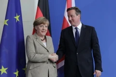 Thủ tướng Anh David Cameron trong chuyến thăm Đức thảo luận về kế hoạch cải cách EU. (Ảnh: Mạnh Hùng/TTXVN)