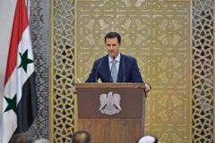 Tổng thống Syria Bashar al-Assad tuyên bố không từ chức trước sức ép của Phương Tây. (Ảnh: AFP/TTXVN)