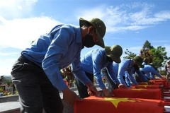 Lễ viếng, truy điệu và an táng hài cốt các liệt sỹ. (Ảnh minh họa. Nguồn: TTXVN)