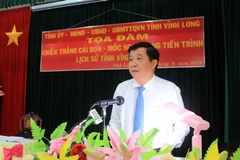 Phó Bí thư Thường trực Tỉnh ủy Vĩnh Long Bùi Văn Nghiêm phát biểu tại buổi tọa đàm. (Ảnh: Phạm Minh Tuấn/TTXVN)